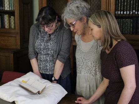Dr Alison Cullingford, Prof Suzanne Trill and Prof Cordelia Beattie look at one of Alice Thornton’s manuscripts.