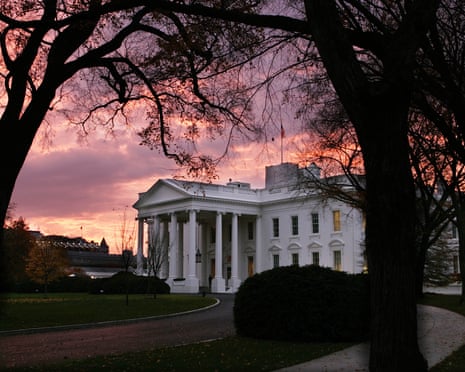 The early morning sunrise warms the sky over the White House Thursday, Nov. 16, 2006, as an approaching storm moves in the Washington area, which is expected to bring in thunderstorms with gusty winds and heavy rainfall. (AP Photo/Ron Edmonds)
