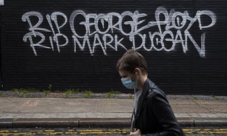 Graffiti in Shoreditch, east London, reads 'RIP George Floyd, RIP Mark Duggan'