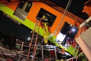 Rescue efforts were briefly interrupted at midnight because the partially hanging train was unstable and a crane had to be brought in