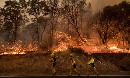 Firefighters battle a wildfire in California.