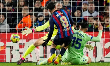 Pedri pounces to keep Barcelona three points clear of Real Madrid at the top of La Liga.