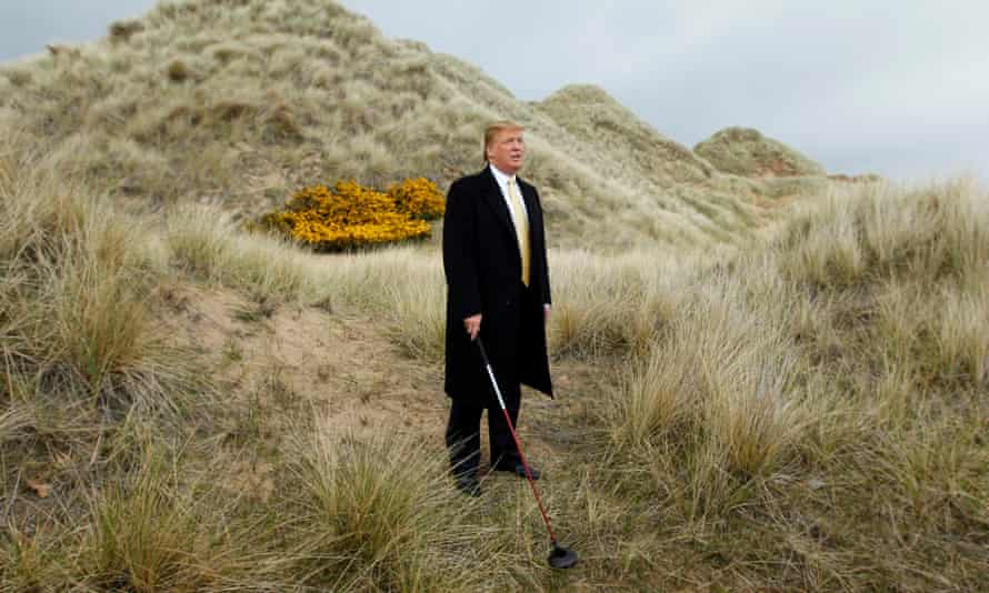 Trump on the sand dunes of the Menie estate in 2010.