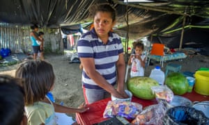 A woman in Pedernales, one of the worst-hit towns. Villages nearby remain without basic aid such as food, water and medicine.