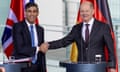 German Chancellor Olaf Scholz with Rishi Sunak after a press conference in Berlin.