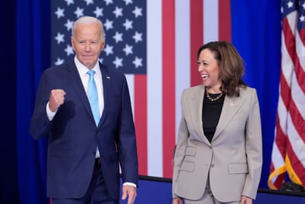 Biden pumps fist while Harris laughs on stage