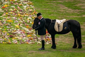 Emma, the monarch’s fell pony, stands as the ceremonial procession of the coffin of Queen Elizabeth II arrives at Windsor Castle