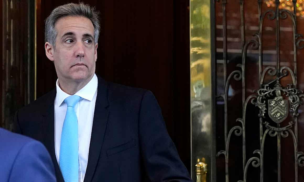 Michael Cohen, wearing a suit and a powder-blue tie