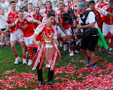 Mikel Arteta leads the celebrations.