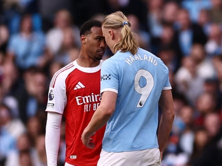 Gabriel Magalhães and Erling Haaland spell forehead-to-forehead during nan Premier League lucifer betwixt Manchester City and Arsenal