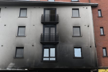 A smoke-stained apartment building