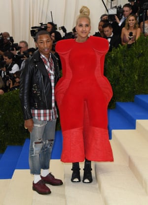 Pharrell Williams at the gala with his wife, Helen Lasichanh, wearing one of Kawakubo’s pieces.