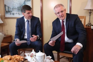 Scott Morrison and Angus Taylor during a visit to the Canberra suburb of Chisholm this morning to discuss power prices with the home owners