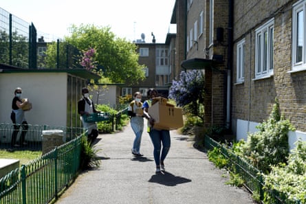 Volunteers deliver food parcels for vulnerable residents of Hackney, east London.