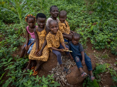 Tralou Trana Jeanette sits with five of her grandchildren.