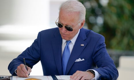 President Joe Biden signs two bills at the White House on 5 August 2022 in Washington, DC.