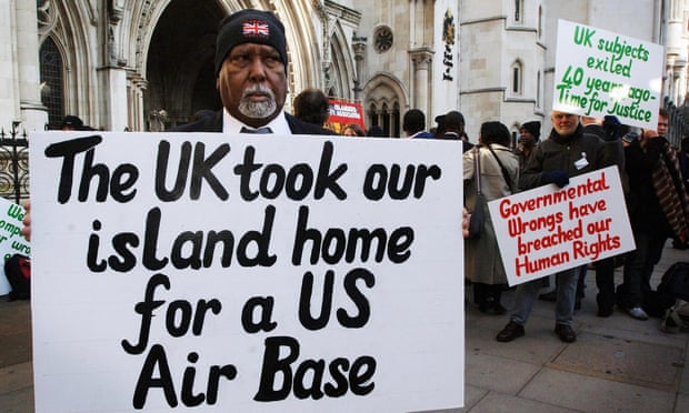 Chagos Islanders protest outside the High Court, London.