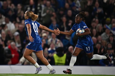 Sandy Baltimore (right) celebrates with Lauren James after giving Chelsea the lead against Manchester City at Stamford Bridge.
