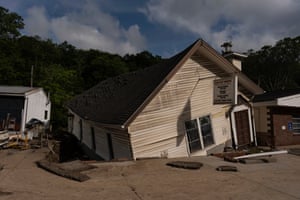 Twisted sunken wooden building