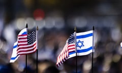 Israeli and US flags.