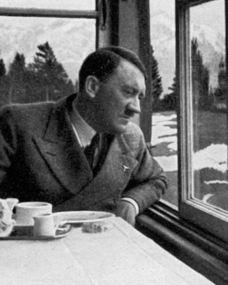 Adolf Hitler admiring the view out a window near Garmisch, Bavaria, Germany, 1936