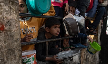 Hungry children at a refugee camp in Palestine