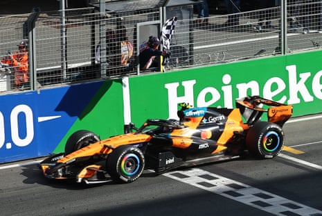 McLaren's Lando Norris crosses the finish line to win the Dutch Grand Prix.