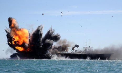 Iran's Revolutionary Guard attacks mock US aircraft carrier in naval drills | Iran | The Guardian
