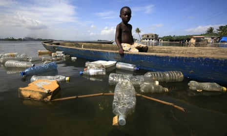 Plastic bottles floating on the Ebrie lagoon in the city of Abidjan, Ivory Coast