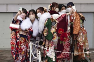 Kimono-clad women celebrating turning 20 years old take selfie together prior to attending a Coming-of-Age ceremony in Tokyo. Held annually on the second Monday of January, Coming of Age Day is a special time for those young adults