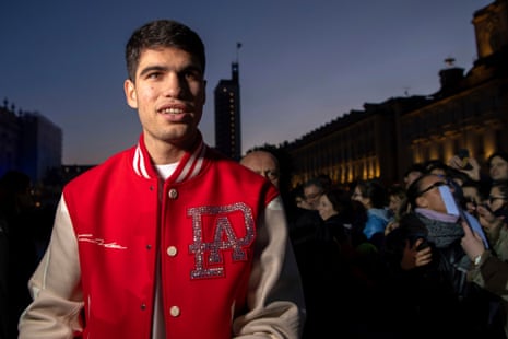 alcaraz in a terrible but not as terrioble varsity jacket