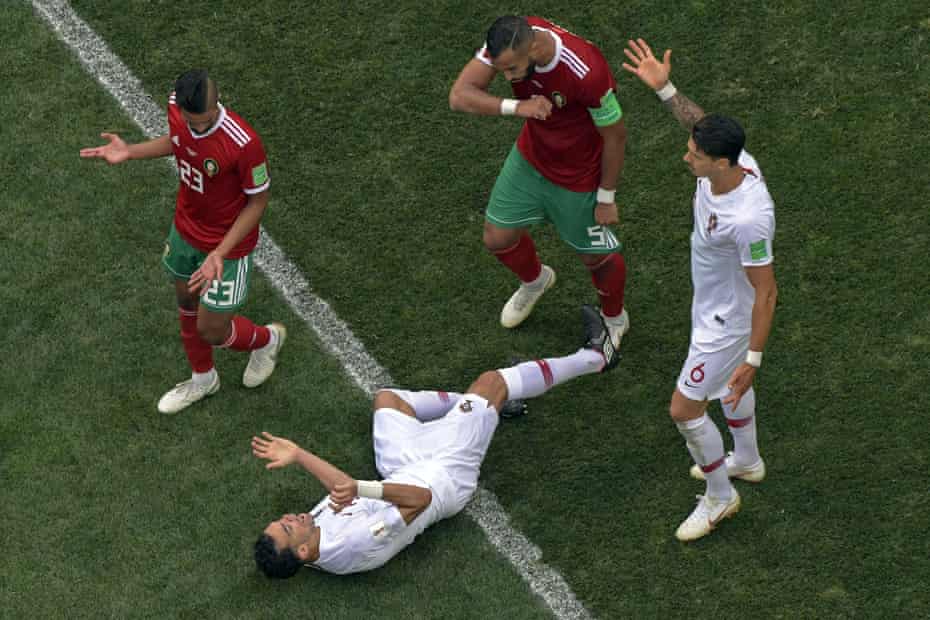 Portugal’s defender Pepe, preparing to leap to his feet after going down in the group game against Morocco.