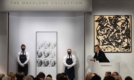 Andy Warhol’s Nine Marilyns (left), which sold for $47.4m, and Jackson Pollock’s Number 17, 1951 (right), up for auction at Sotheby’s in New York