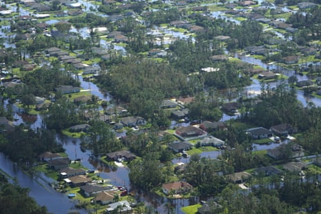 Aerial shot of town with water in the streets