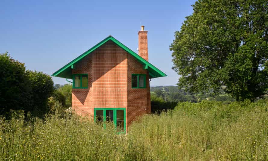 The windows and door of an end elevation of the Red House recall the eyes and mouth.