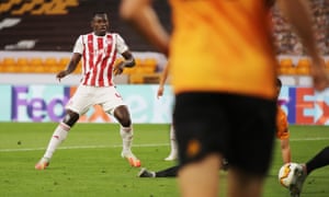 Olympiacos’ Mohamed Camara slots the ball home.