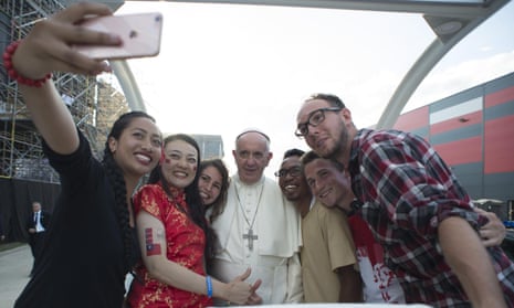 Pope Francis poses for a selfie with youths
