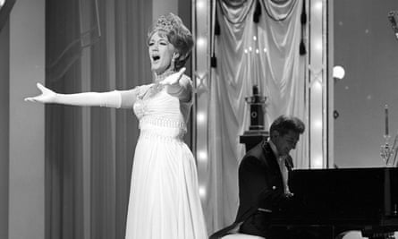 ghost singer example Marni Nixon with Liberace in 1966.