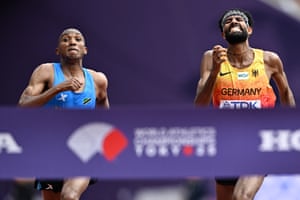 Tanzania’s Alphonce Simbu (left) and Amanal Petros of Germany race for the line in the men’s marathon final. Simbu crossed the line 0.03sec ahead of Petros, a narrower gap than the men’s and women’s 100m finals.