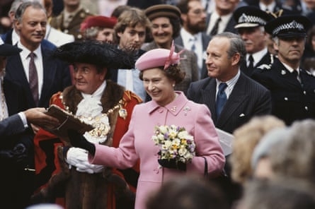 The queen on a walkabout in Rochester, Kent, with Heseltine walking behind, October 1984.
