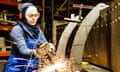 Young female trainee works with a grinder in a workshop, flying sparks<br>‘If we can get girls to understand that they could make a difference, then they’d be able to see a path for themselves’: Climer