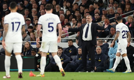 Ange Postecoglou gestures towards his Tottenham players during the defeat to Manchester City