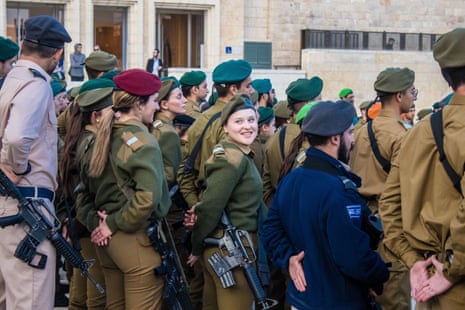 An induction ceremony for new graduates of the Israel Defence Force. This ceremony took place in front of the Western Wall in Jerusalem