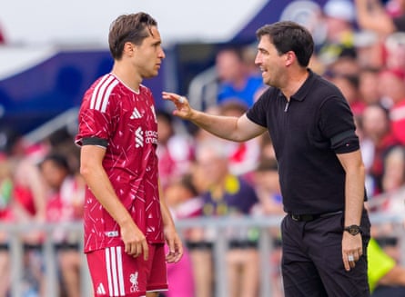 Liverpool head coach Andoni Iraola speaks with Federico Chiesa on Saturday
