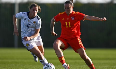Natasha Harding, who set up one Wales goal and scored another, tries to break clear of Scotland’s Lisa Robertson in Murcia, Spain.