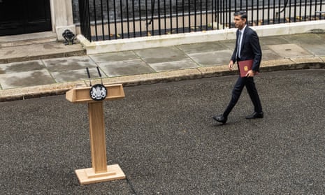 Plain and clean-cut … Rishi Sunak prepares to speak outside No 10 Downing Street on Tuesday.