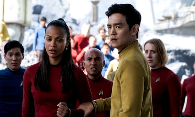 To boldly go: John Cho with Zoe Saldana in Star Trek.