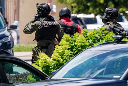 Police officers patrol outside