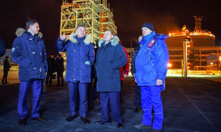 Vladimir Putin (second right), accompanied by Novatek chair, Leonid Mikhelson (second left), and Russia’s energy minister, Alexander Novak (left), visiting a Yamal LNG plant in the port of Sabetta in 2017.