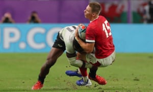 Liam Williams of Wales is tackled by Semi Radradra of Fiji.
